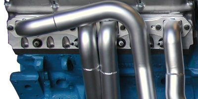 Ceramic-coated header tubes with a smooth metallic finish.